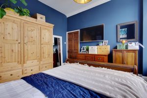 Bedroom One- click for photo gallery